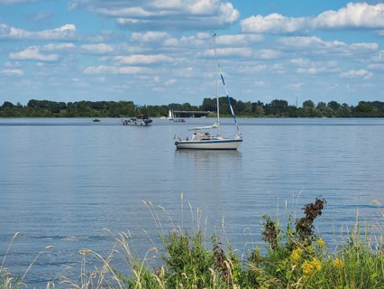 View of a lake with a sailing boat, Roermond, Netherlands