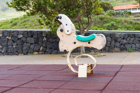 Rabbit-shaped spring rocking games in a playground on the island of Tenerife