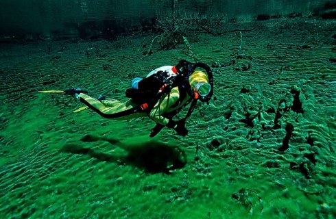 Diver in a mountain lake, Austria, Tyrol, Europe