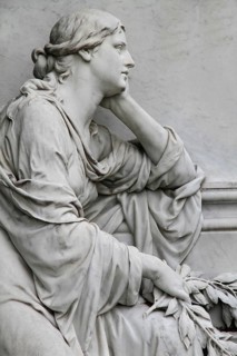 Cemetery mourning statue of a woman