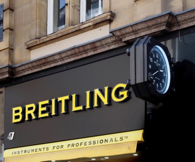Leeds, west yorkshire, united kingdom, 7 july 2021: Breitling clock logo and slogan on berrys store