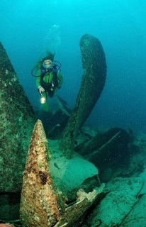 Diver and propeller of the wreck Astron, Parapriacanthus ransonneti, Punta Cana, Caribbean Sea,