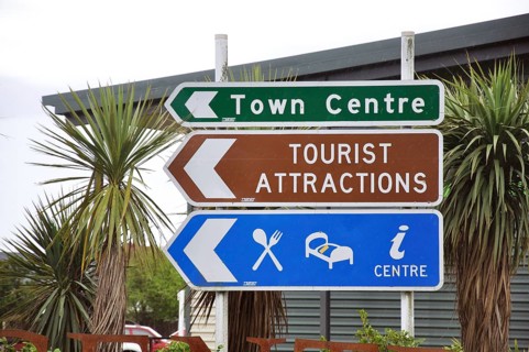 Signs directing tourists to the centre of Hokitika, West Coast, New Zealand, Oceania