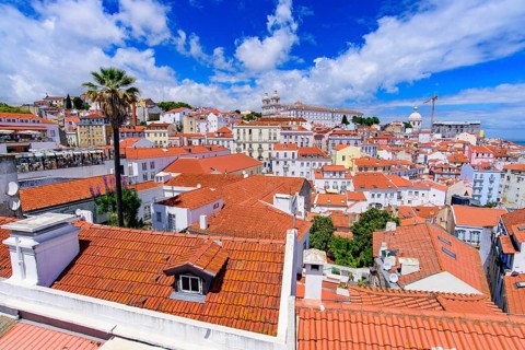 View of the city & Tagus River from Miradouro de Santa Luzia, an observation deck in Lisbon,