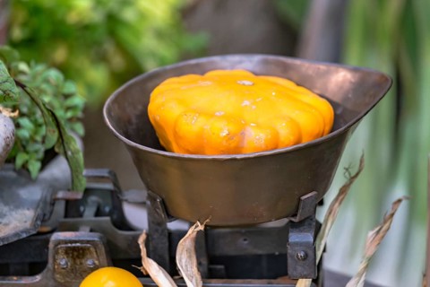 Yellow squash pumpkin in nostalgic market scales