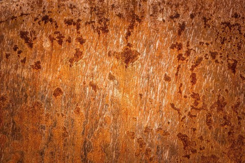 Old rusty metal plate surface very aged and corroded. Image great as background, layer or a rusty