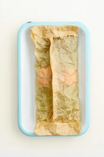 Green asparagus with salmon to bake with baking paper in a baking dish