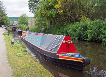 Hebden, west yorkshire, united kingdom, 28 may 2019: vintage canal boats passing though black pit