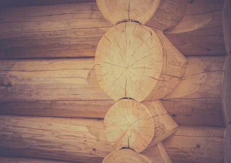 Architectural image with the exterior corner and part of the wall of a log house, traditional built