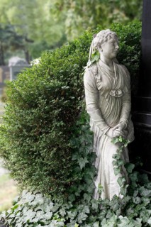 Cemetery mourning statue of a woman