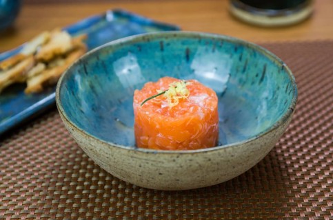 Salmon tartare deliciousness in a beautiful decorated plate
