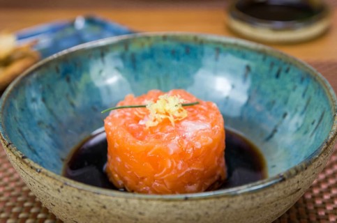 Salmon tartare deliciousness in a beautiful decorated plate