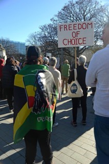 CHRISTCHURCH, NEW ZEALAND, JULY 24, 2021, People at a protest rally at the Bridge of Remembrance in