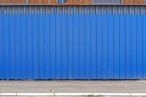 Corrugated steel metal blue fence exterior