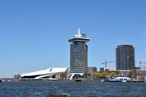 Amsterdam, Netherlands. April 2023. The river IJ with the Eye museum and a canalboat