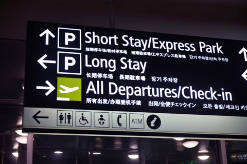 Airport signage directing passengers to parking areas