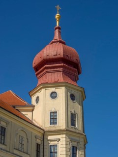 Baroque tower with red roof under a bright blue sky, Dürnstein, Wachau, Danube, Austria, Europe