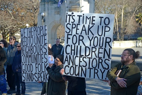 CHRISTCHURCH, NEW ZEALAND, JULY 24, 2021, Detail of a placard at a protest rally at the Bridge of