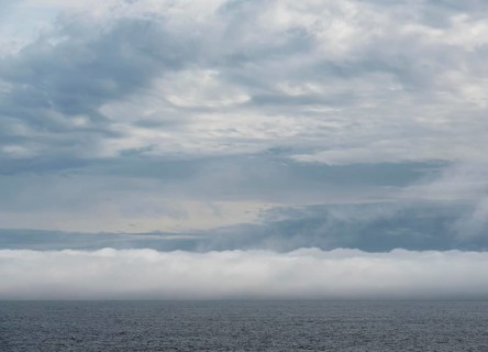 Off the west coast of Vancouver Island, a huge wall of fog has formed on the Pacific Ocean