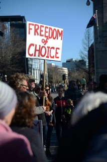 CHRISTCHURCH, NEW ZEALAND, JULY 24, 2021, Detail of a placard at a protest rally at the Bridge of