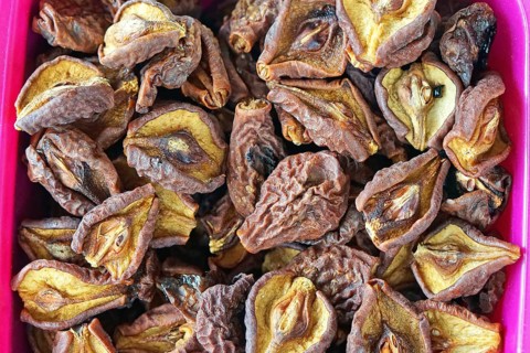 Dried and dehydrated pears fruits in crate