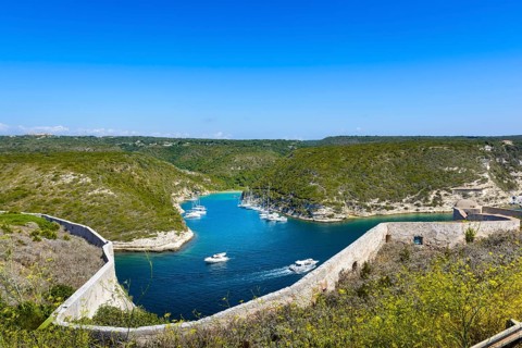 Arbor, boats, landscape and blue sky at Bonifacio, Corsica