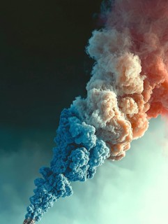 Colorful smoke clouds with blue and pink hues rising into the sky, AI generated
