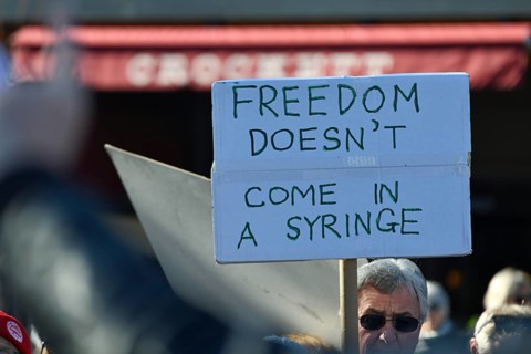 CHRISTCHURCH, NEW ZEALAND, JULY 24, 2021, Detail of a placard at a protest rally at the Bridge of