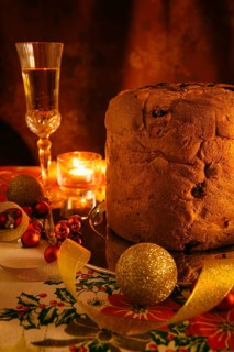 Italian panettone and sparkling wine with Christmas decorations