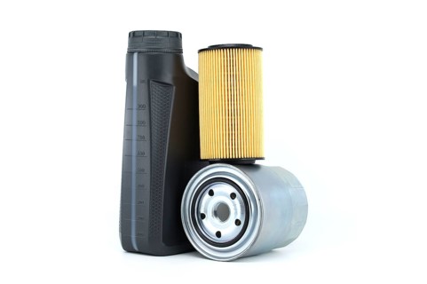 Motor oil container and filters isolated on a white background. Car servicing, automotive industry