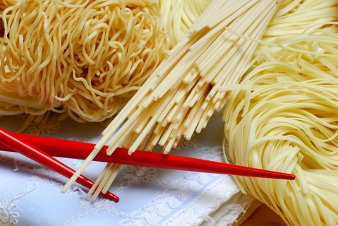 Chinese nest noodles and Chinese spaghetti, chopsticks, noodles