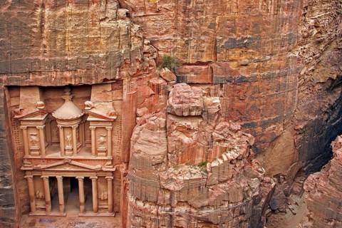 Al Khazneh, the treasury, carved out of a sandstone rock wall in the ancient city of Petra in
