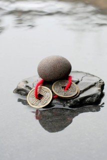 Stones and Chinese lucky coins, coins, lucky coins, lucky coin, coin, in water
