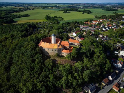 Schönfels Castle with the newly renovated keep (castle tower) . Schönfels Castle is a typical