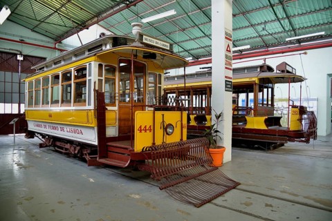 Old trams in the Museu da Carris tram museum, Lisbon, Portugal, Europe
