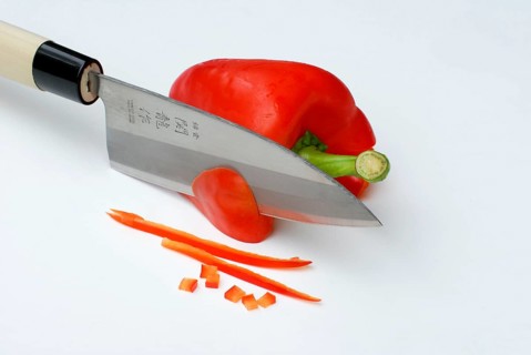 Japanese knife and paprika (Capsicum annuum)