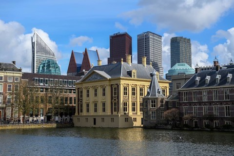 Museum Mauritshuis at the Hofvijver, Hofweiher, in the background the modern skyline, The Hague,
