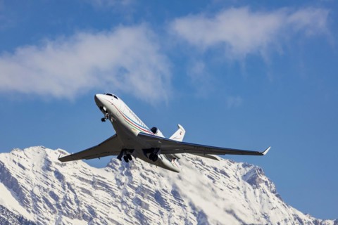 Aircraft of the airline Palmali Air taking off at Innsbruck Kranebitten Airport, Dassault Falcon 7X