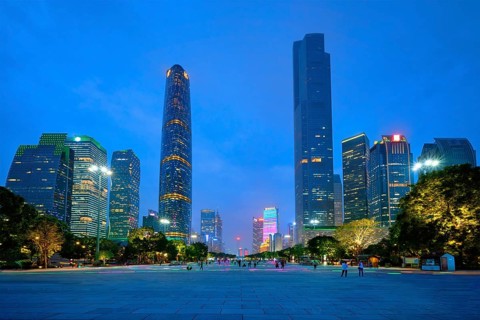 Guangzhou cityscape skyline Flower City Square illuminated in the evening. Guangzhou, China, Asia