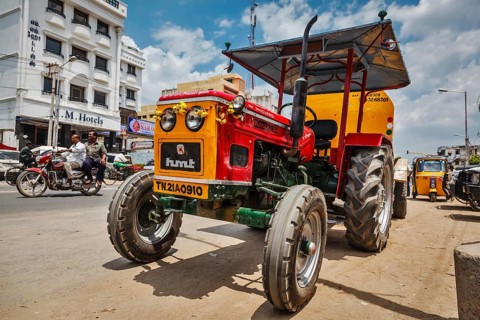 KANCHIPURAM, INDIA, SEPTEMBER 12, 2009: Wheeled tractor in indian street
