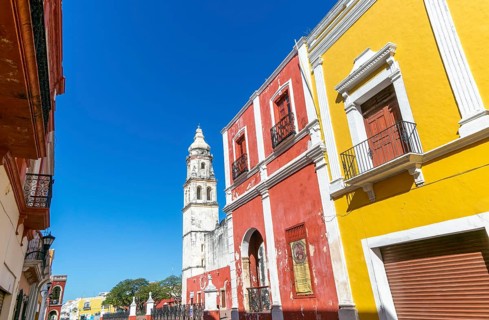 Row of colourful Spanish colonial buildings, Campeche city centre, Campeche State, Mexico view to