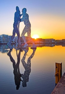 Molecule Man, monumental artwork in the Spree at sunrise, artist Jonathan Borofsky, Berlin,