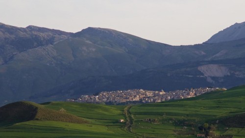 Mountains, green hillsides, city, lush green meadows, Madonie National Park, spring, Sicily, Italy,