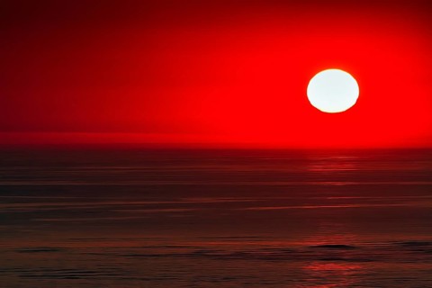 Red sunset in the haze, Bassin d'Arcachon, Bay of Biscay, France, Europe