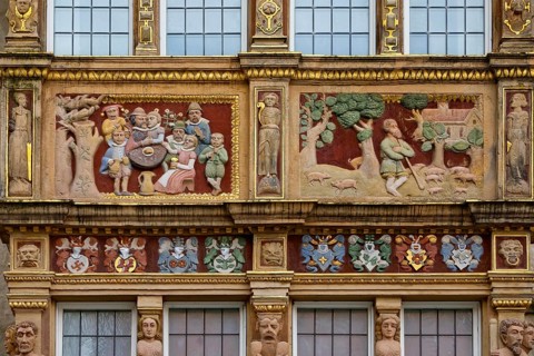 Parapet panels on the Renaissance bay window, Tempelhaus, Gothic patrician house on the historic