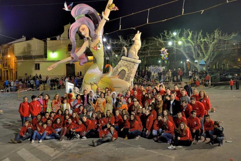 "La Font" Fallas group in front of a Falla, a papier-mâché figure, at the Falles or Fallas spring