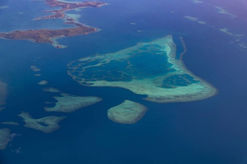 Aerial of little islets of the coast of Viti Levu, Fiji, South Pacific, Oceania