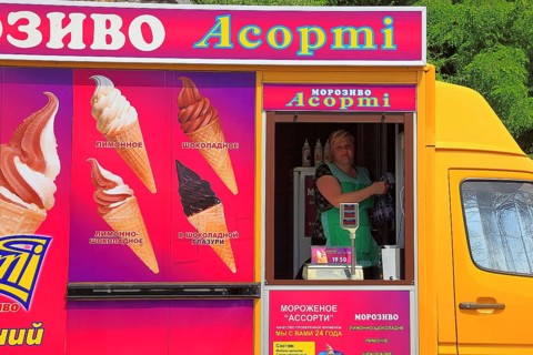 Ukraine, city of Kiev, colourful mobile soft ice cream stall, Europe