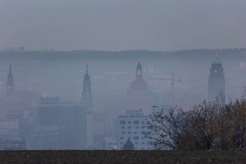 View from Dresden's Südhöhe of the city centre with its towers sinking into the fog
