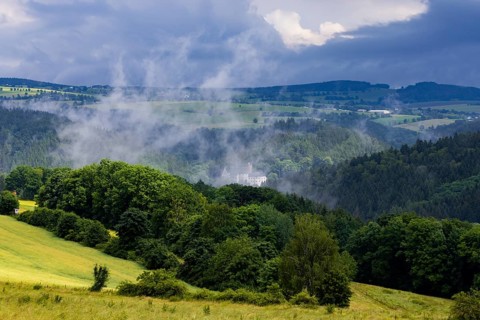 Scharfenstein Castle seen through the rain and fog
